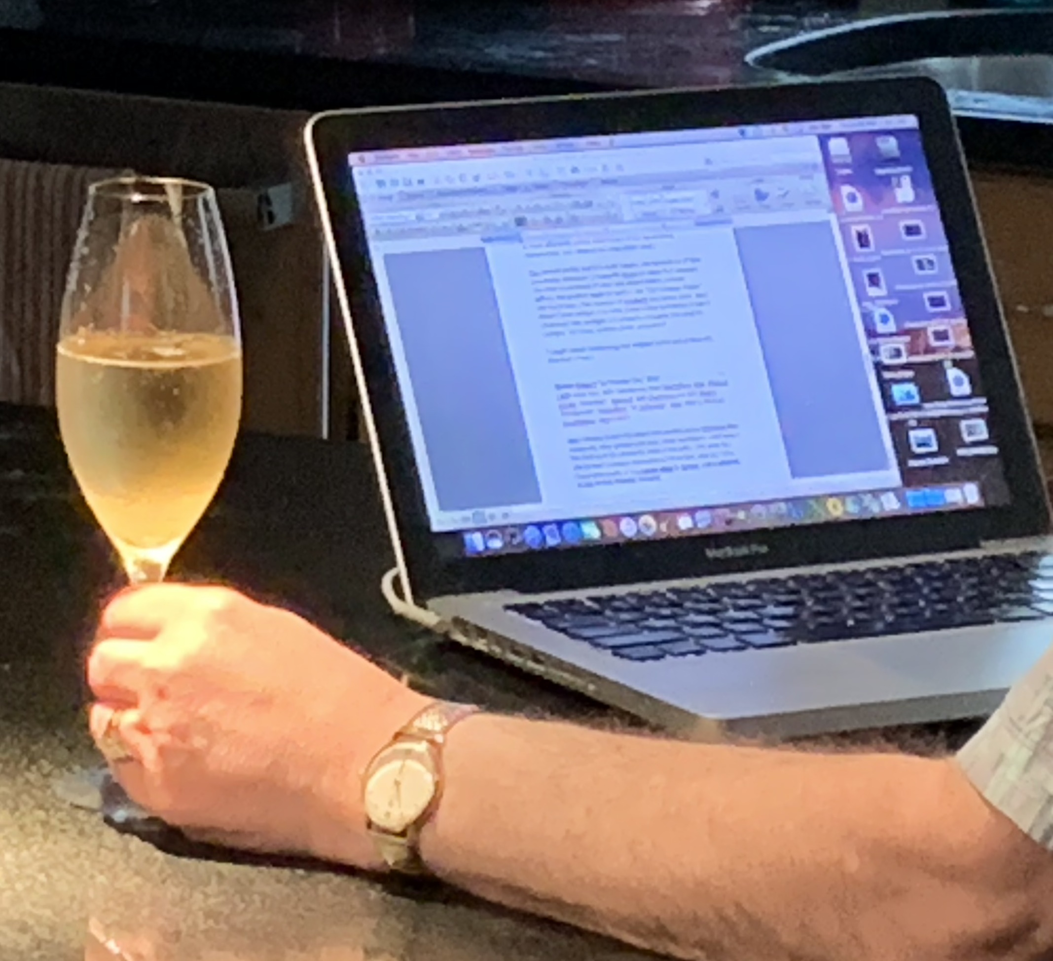 drinking Champagne in front of the computer