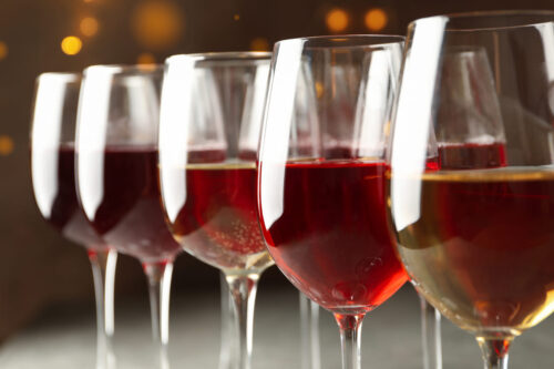 wine in wine glasses lined up