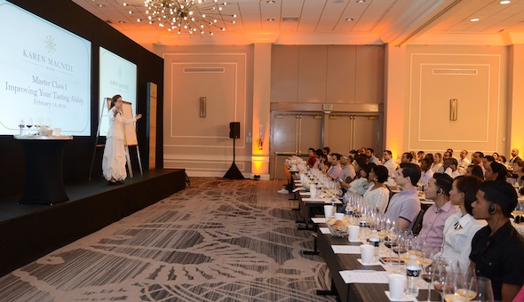 karen wine keynote speaking in front of large room of people